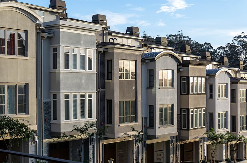 A row of six, three-story townhomes